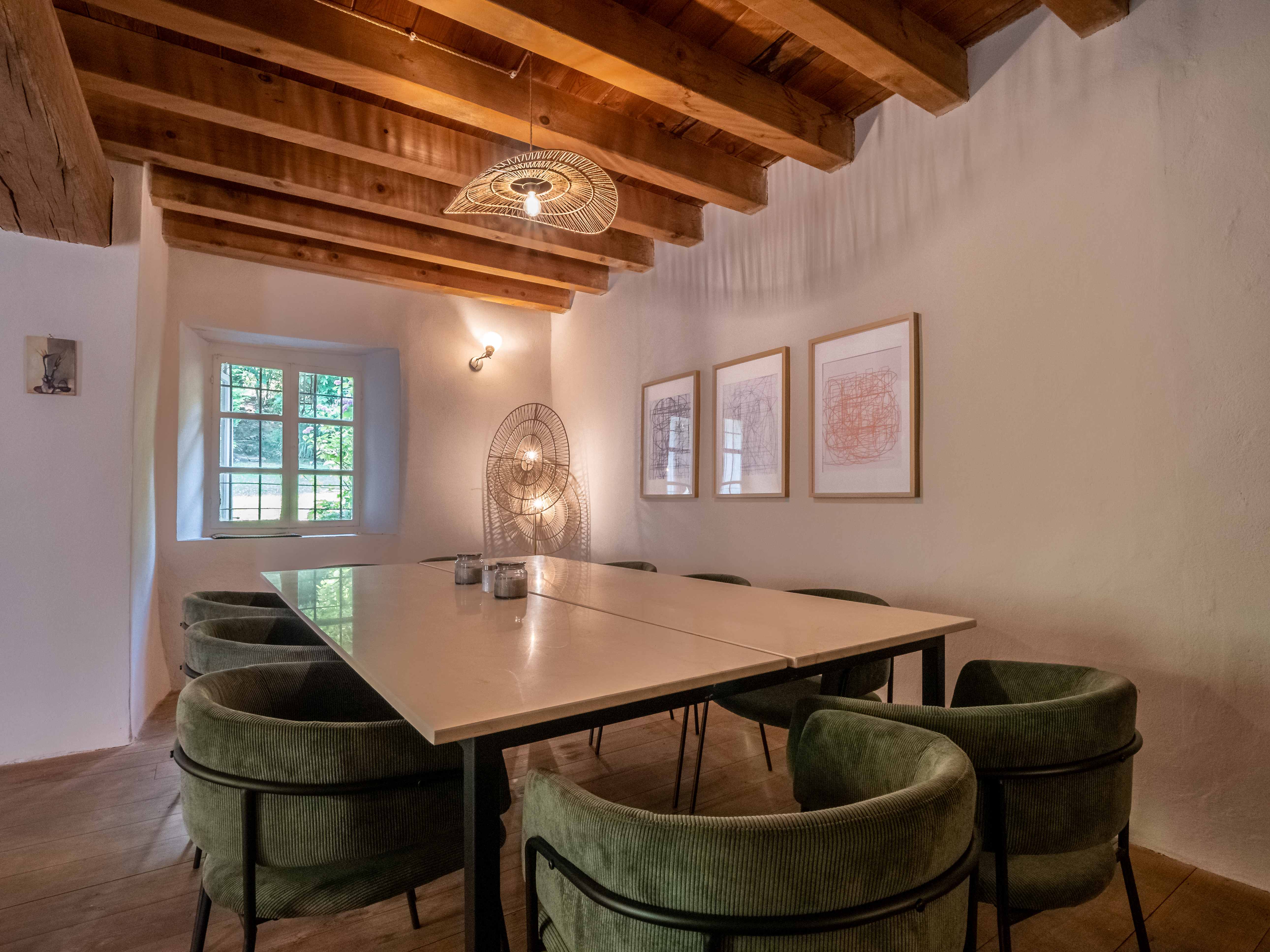 Cozy living room dining area with vintage furniture