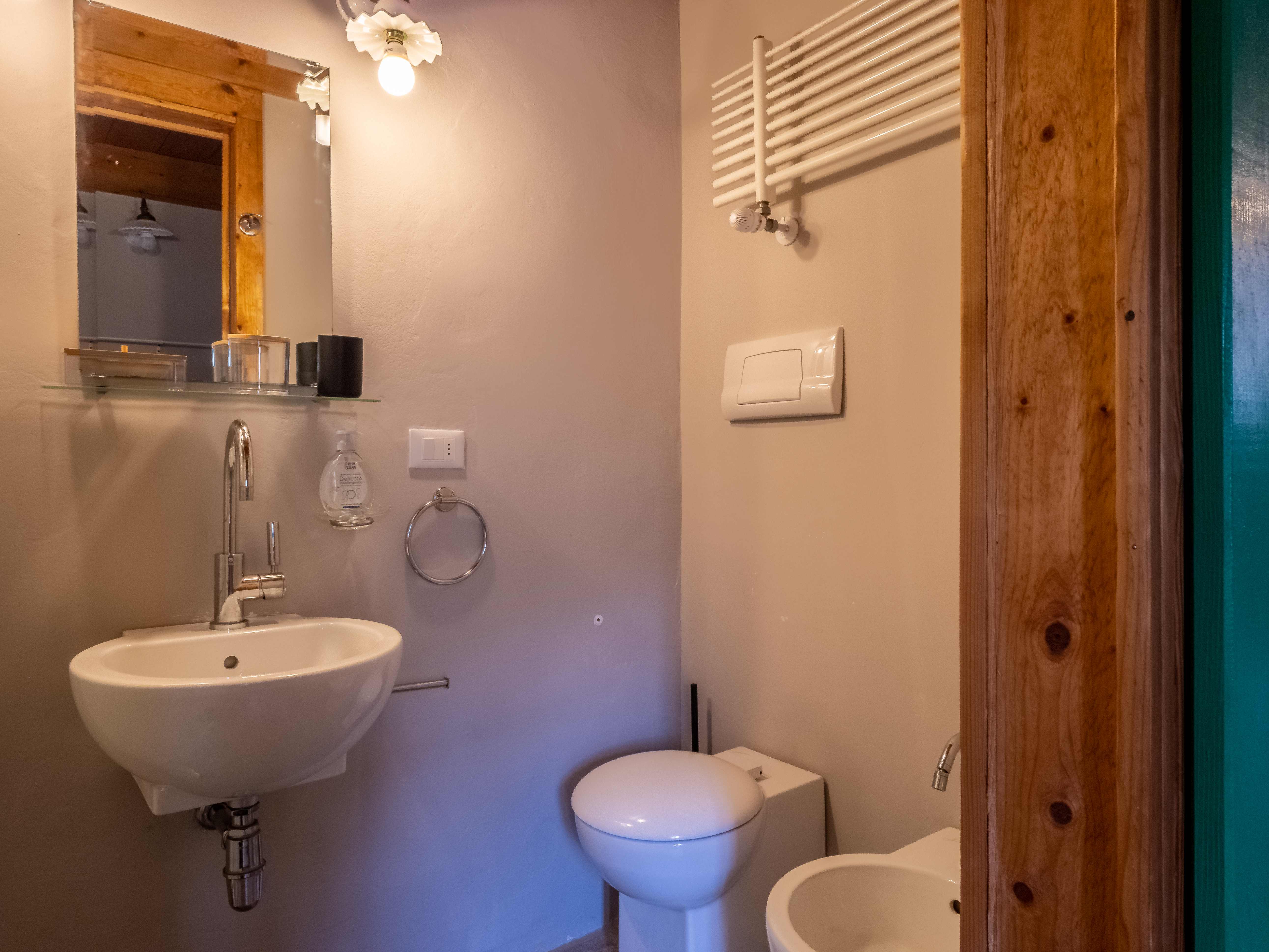 Modern ensuite bathroom with contemporary white fixtures