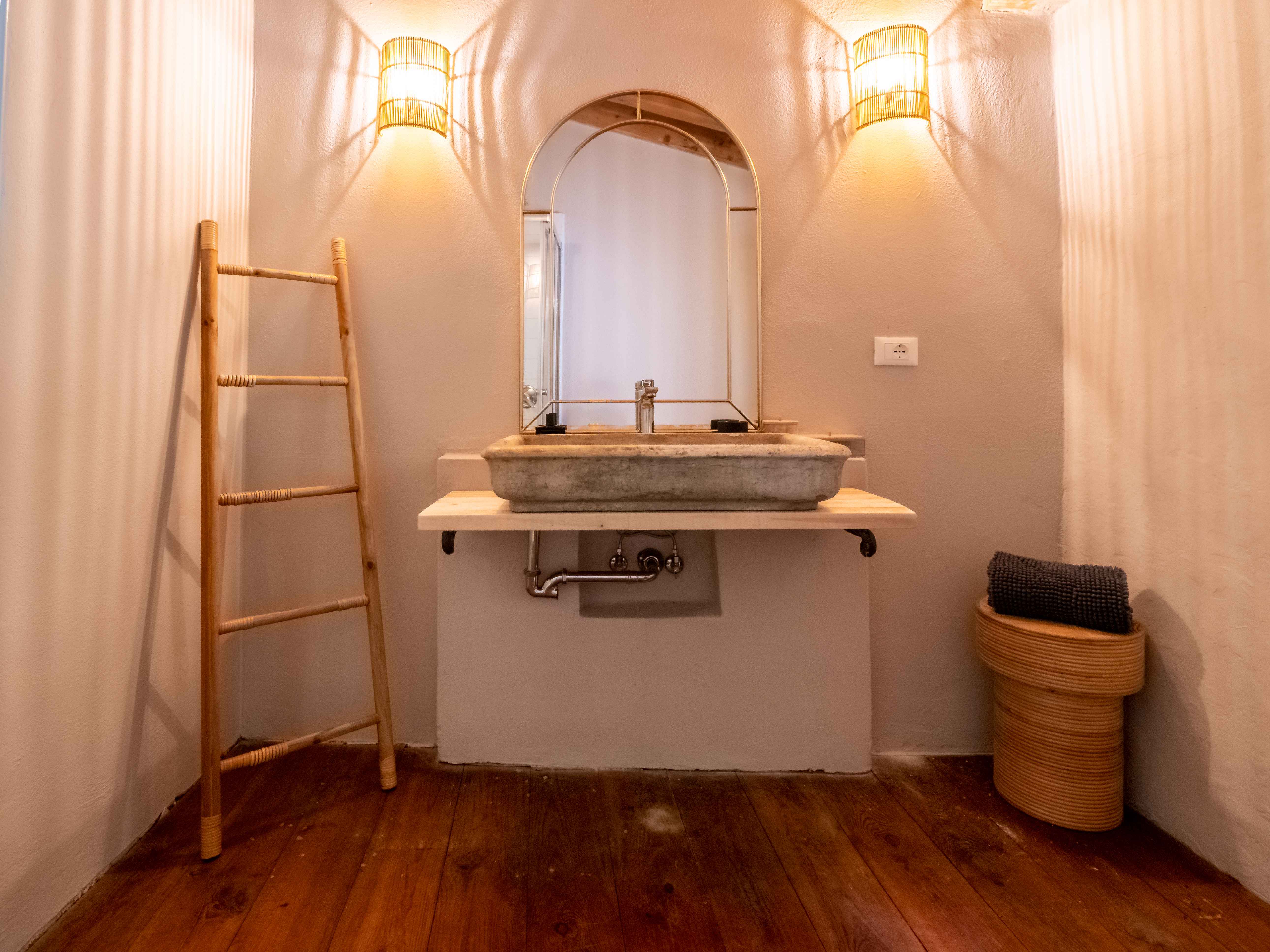 Sophisticated bathroom vanity with natural stone sink